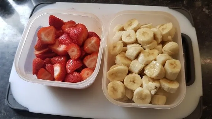 Image for step 2 of our dairy free ice cream recipe - frozen bananas and strawberries