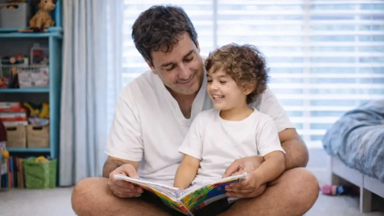 A father reading a fun story to his child